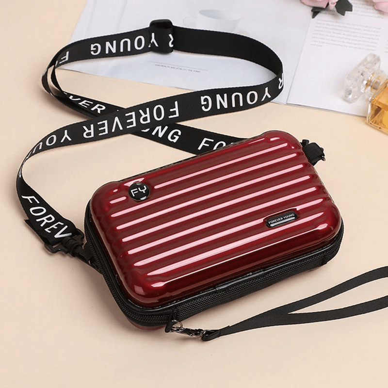 Reiseveske-inspirert crossbody-veske