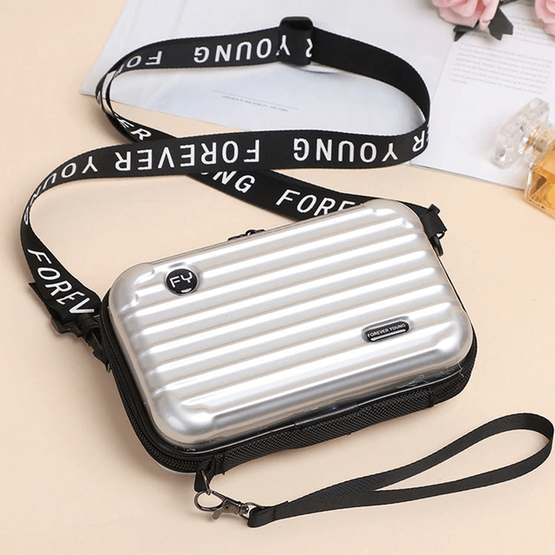 Reiseveske-inspirert crossbody-veske