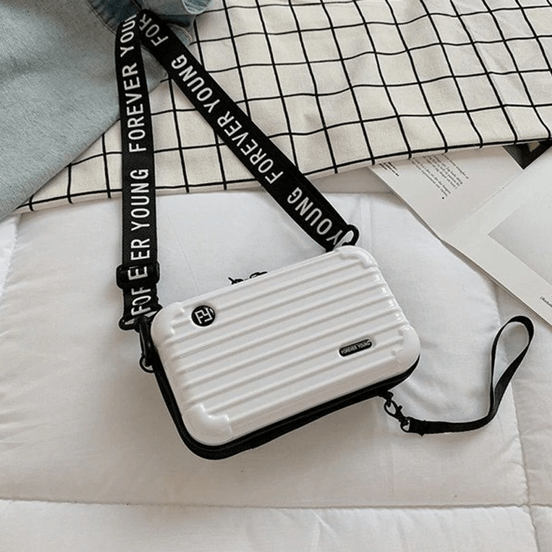 Reiseveske-inspirert crossbody-veske