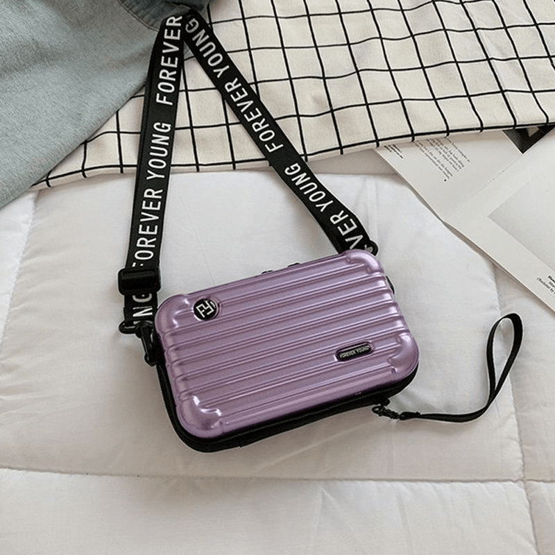 Reiseveske-inspirert crossbody-veske