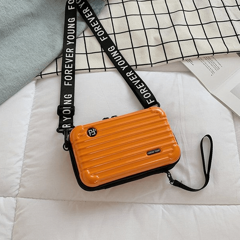 Reiseveske-inspirert crossbody-veske