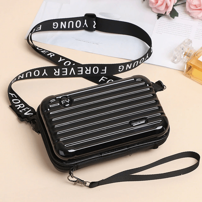 Reiseveske-inspirert crossbody-veske