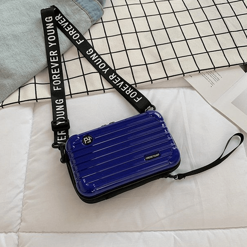 Reiseveske-inspirert crossbody-veske