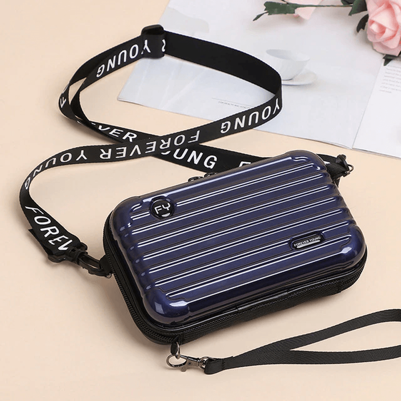 Reiseveske-inspirert crossbody-veske
