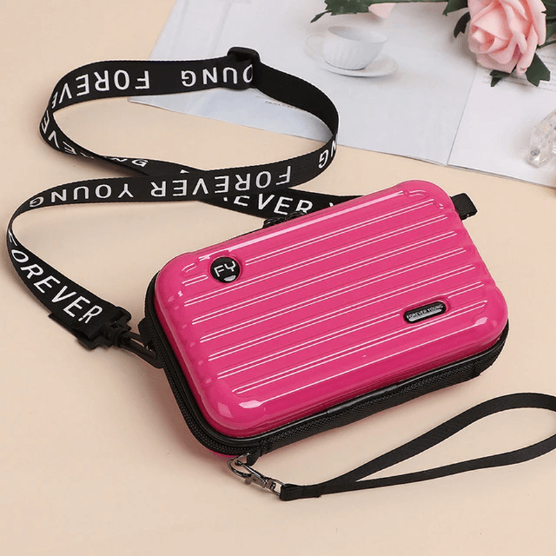 Reiseveske-inspirert crossbody-veske